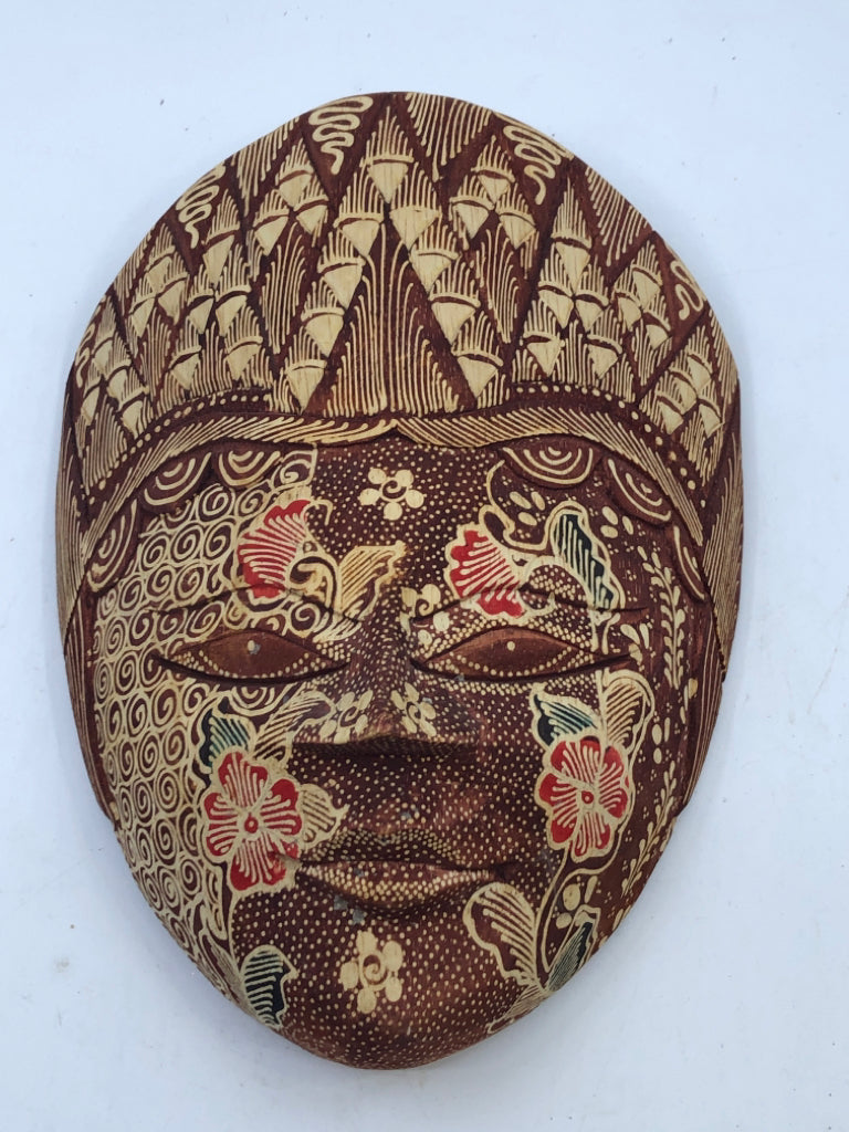 MAROON CARVED MASK WALL HANGING.