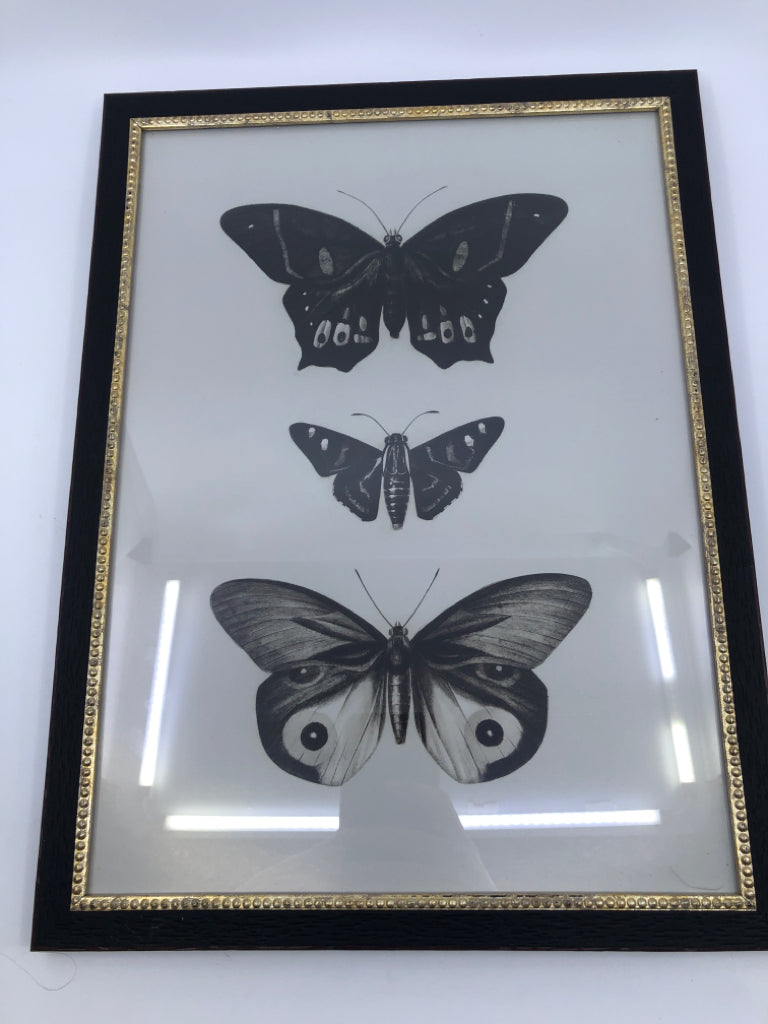 3 BUTTERFLIES IN BLACK FRAME WALL HANGING.