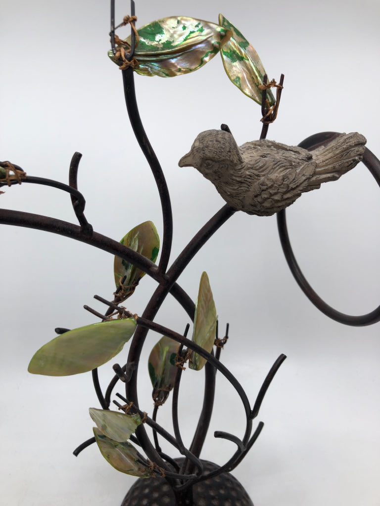 BROWN METAL W/LEAVES AND BIRDS TOWEL HOLDER.