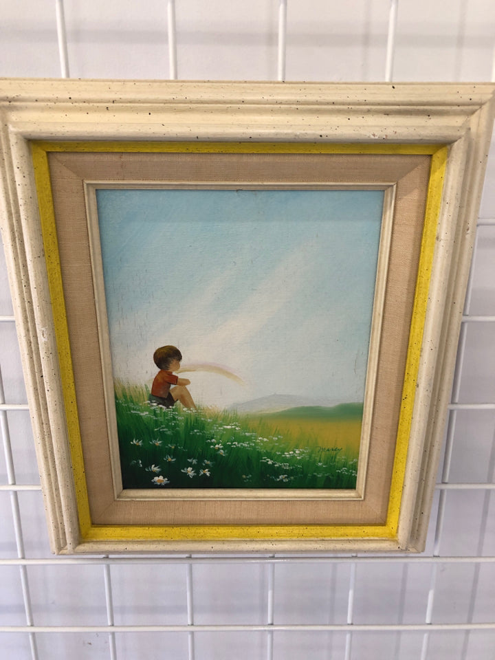 VTG BOY SITTING IN FIELD WALL ART IN THICK WOOD FRAME.