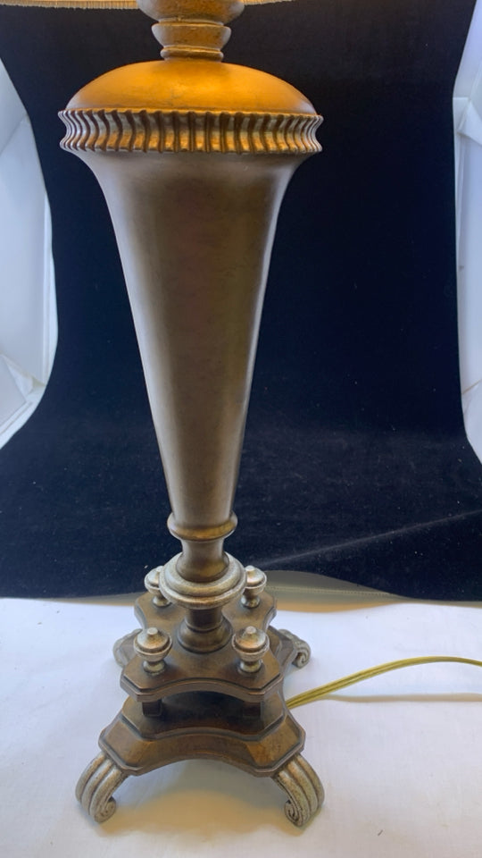 BRONZE BASE TABLE LAMP W/TAN TEXTURED STRIPE SHADE.