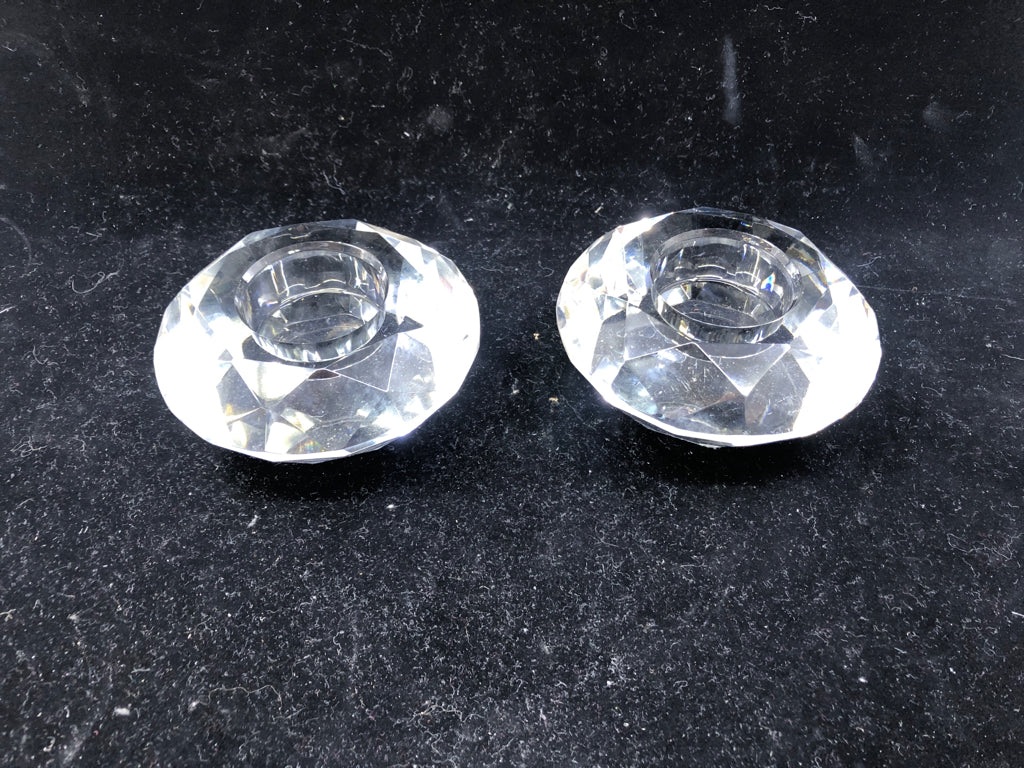 2 CRYSTAL CUT GLASS CANDLE HOLDERS.