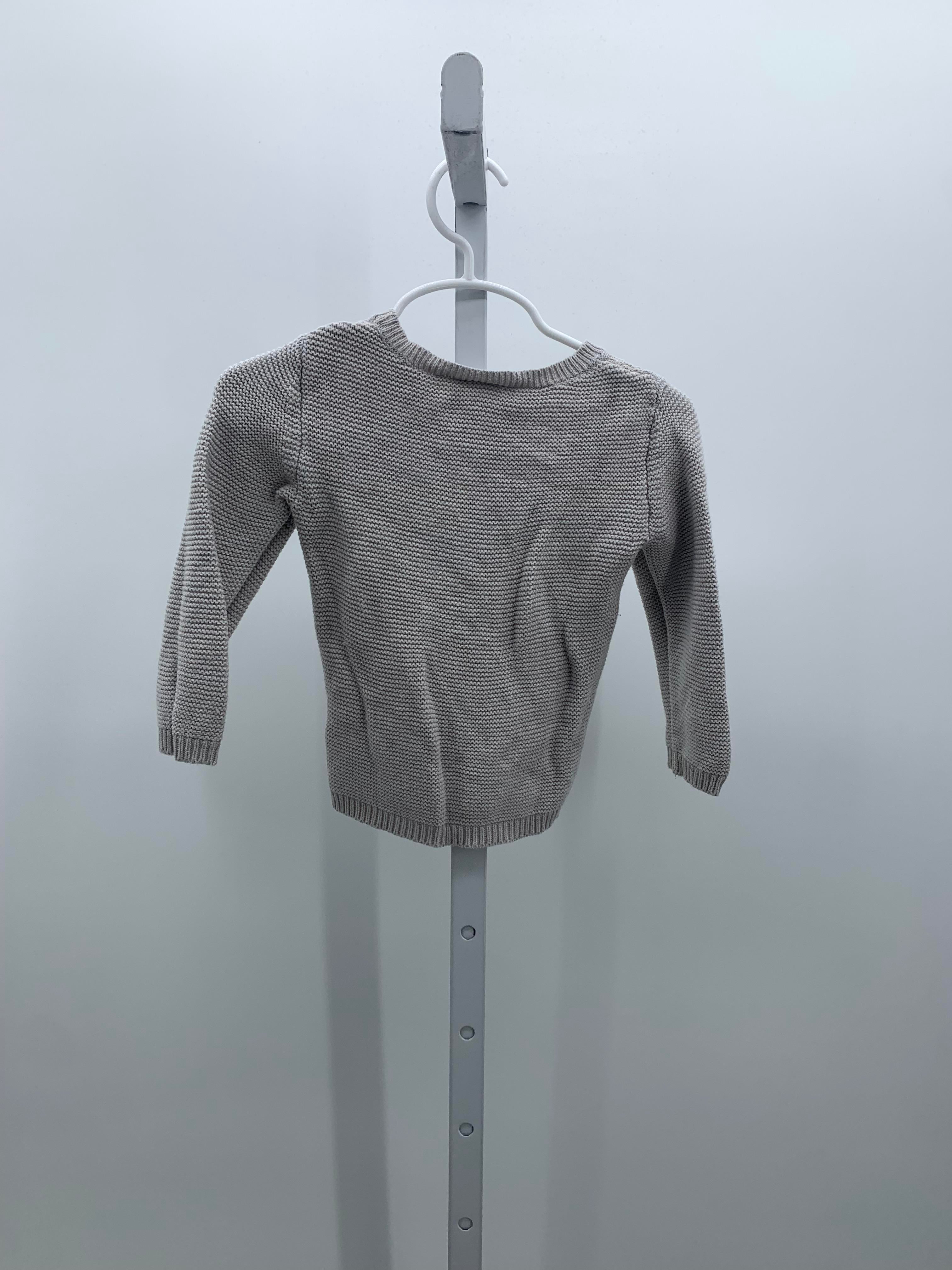 CABLED SWEATER