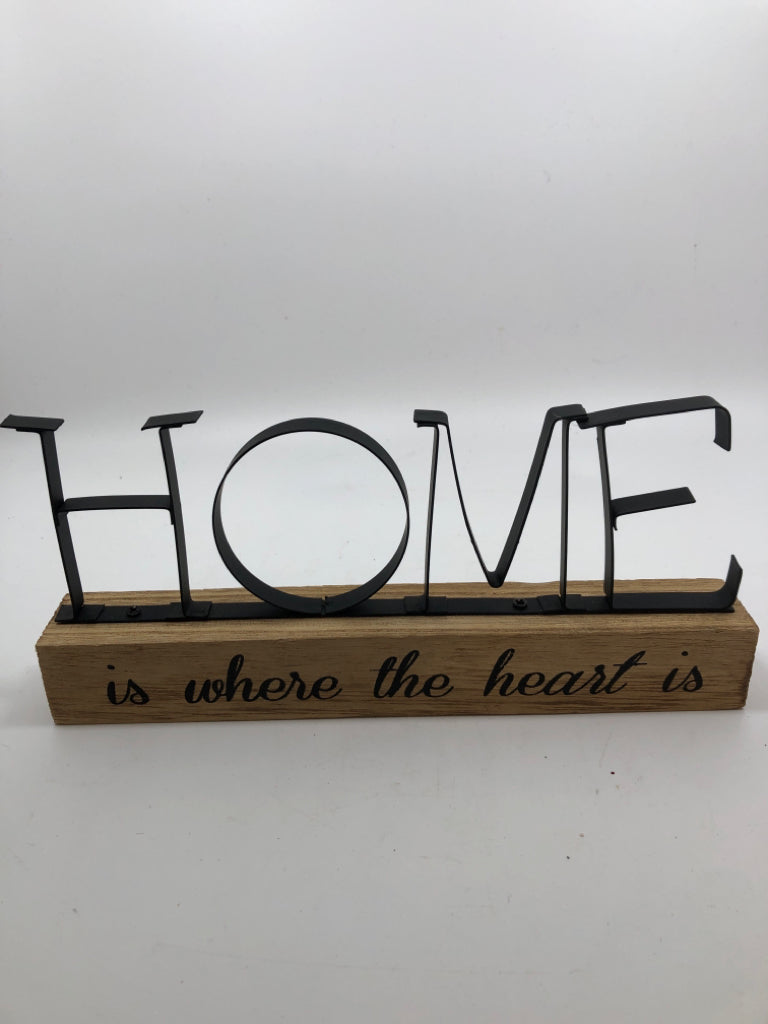 "HOME" METAL SIGN ON WOOD BLOCK.