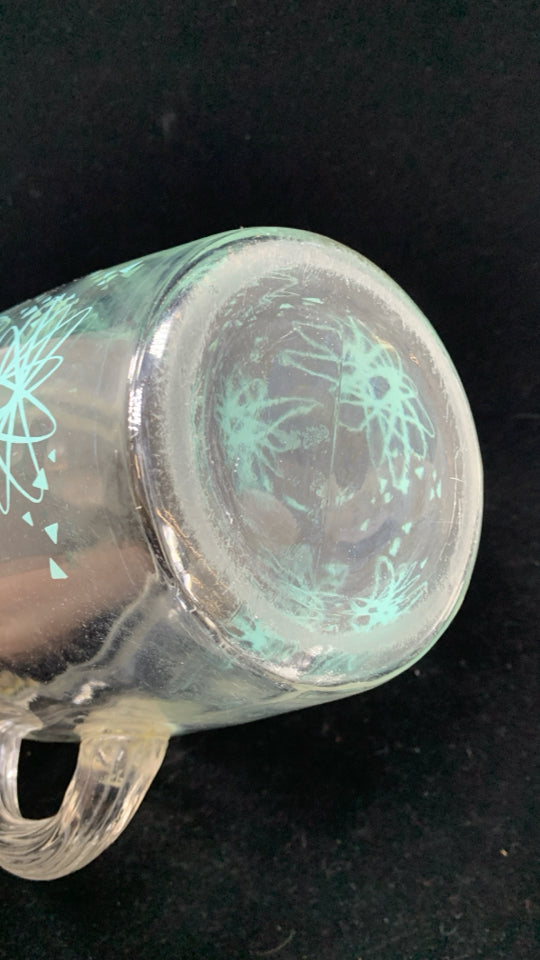 VTG TEAL STARBURST GLASS PITCHER W/ICE LIP.