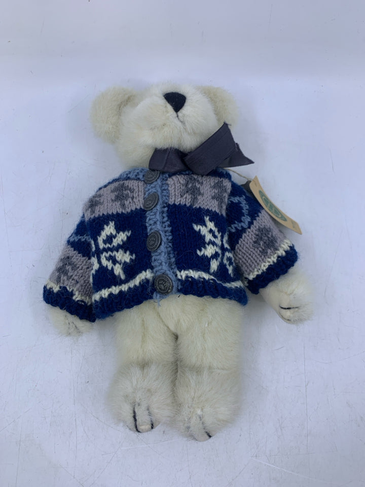 WHITE BEAR W/ SNOWFLAKE SWEATER ON.
