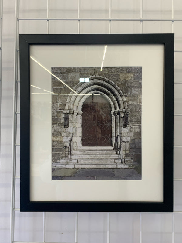 STONE ENTRANCE TO A CHURCH W/ GRAND DOOR IN BLACK BORDER WALL ART.
