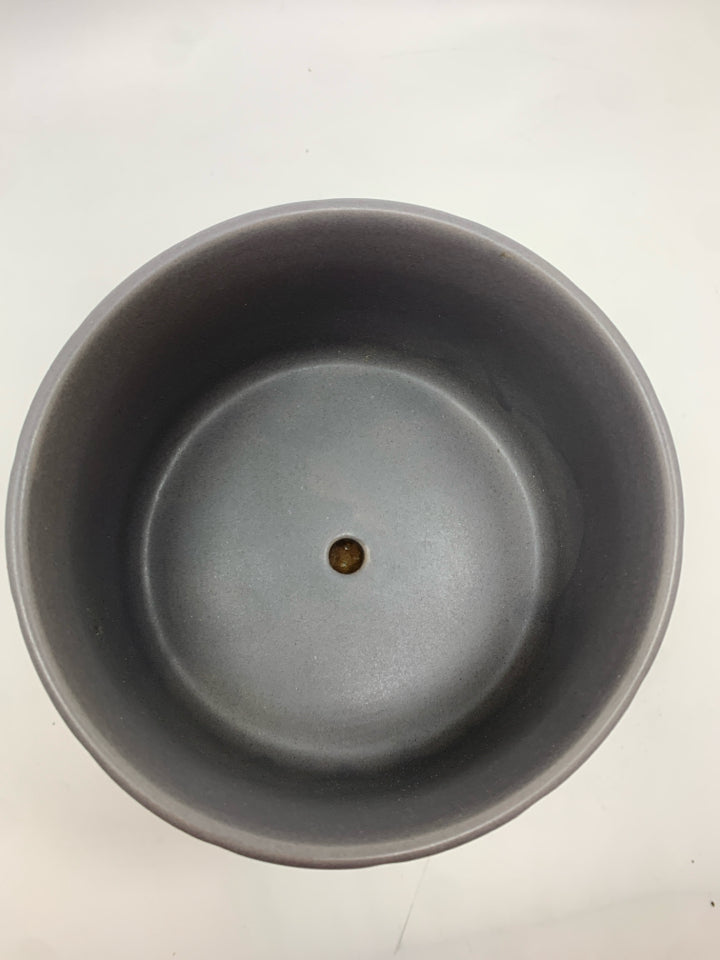 GREY CERAMIC PLANTER W/WOODEN STAND.