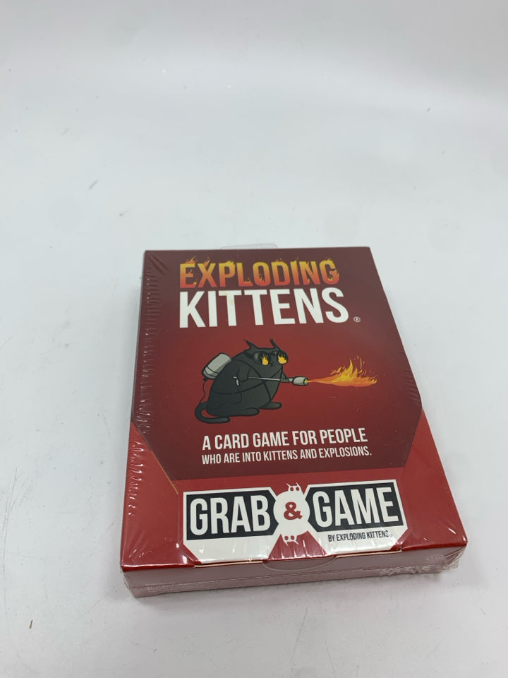 NIP EXPLODING KITTENS CARD GAME.