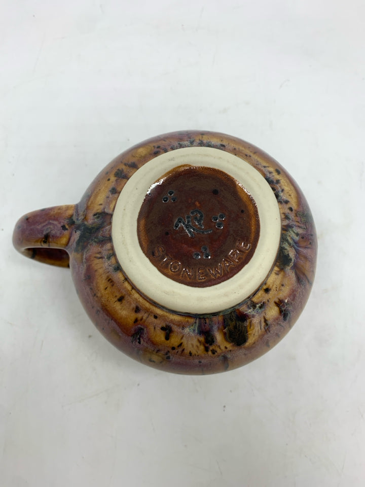 PURPLE GLAZED STONEWARE MUG W/BLACK SPECKLES.