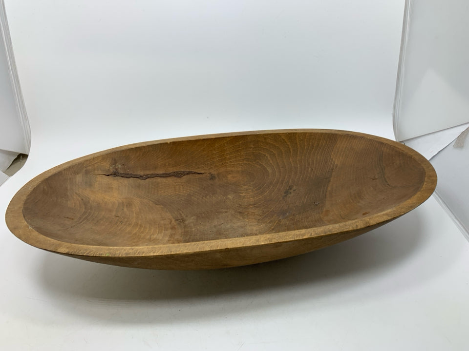 RUSTIC OVAL DARK WOOD CARVED BOWL.