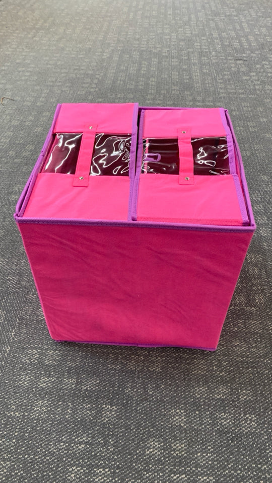 STACKED PINK & PURPLE COLLAPSING BINS.