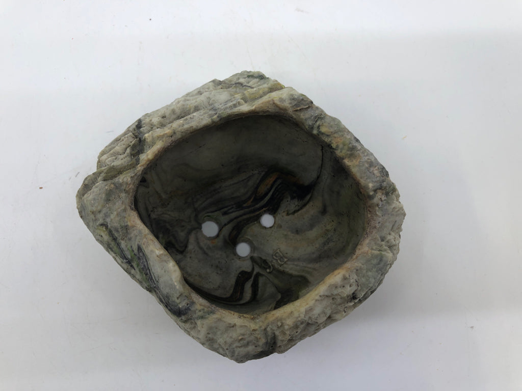 RESIN ROCK PLANTER.