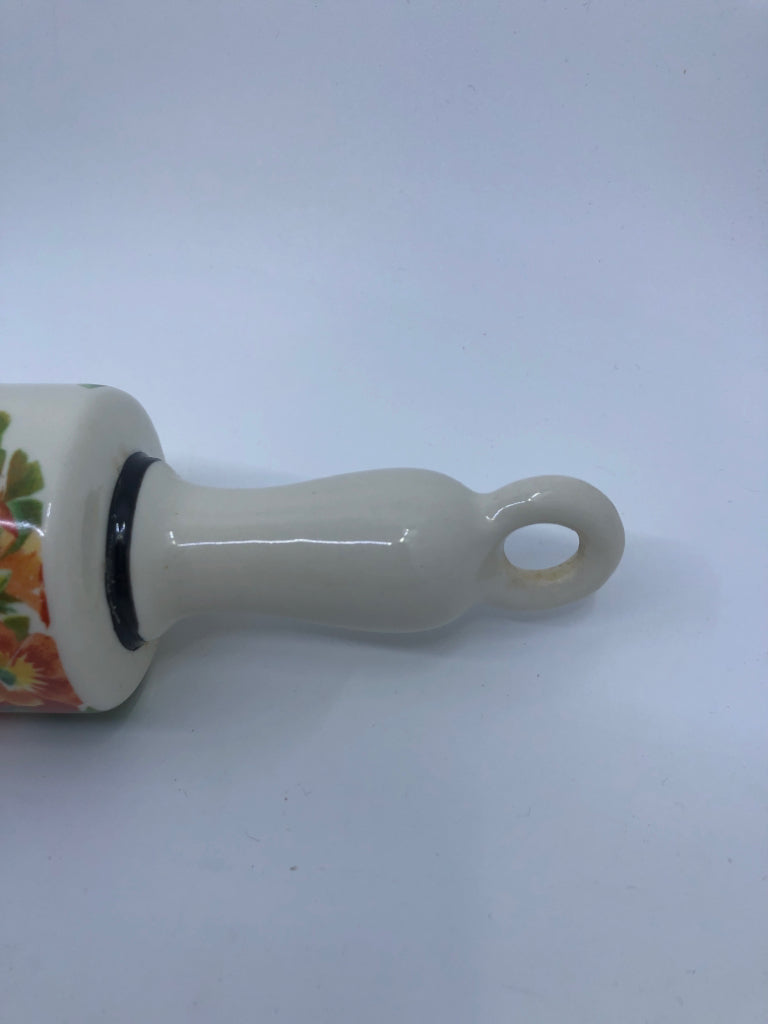 WHITE W FLORAL CERAMIC HANGING FILLABLE ROLLING PIN.