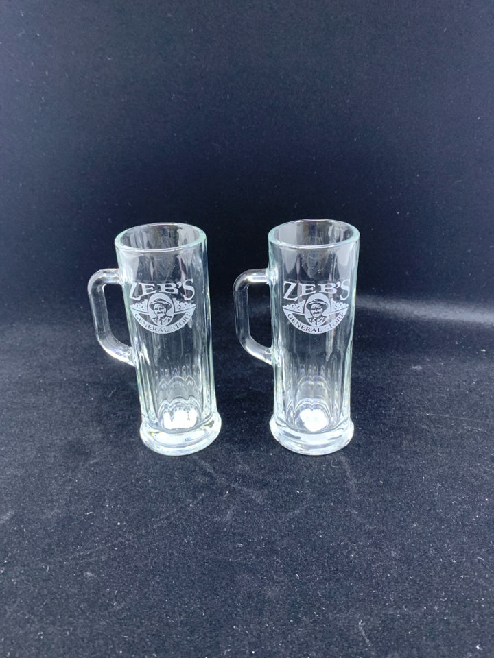 2 ZEB'S SHORT GLASSES W HANDLES.