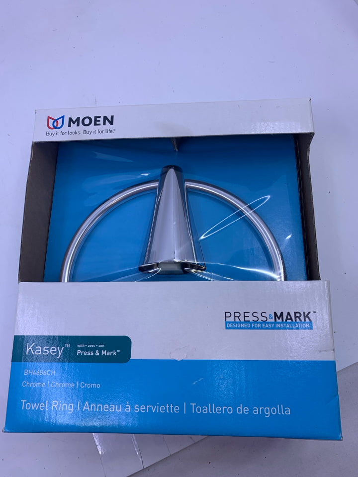 NIB MOEN TOWEL RING.