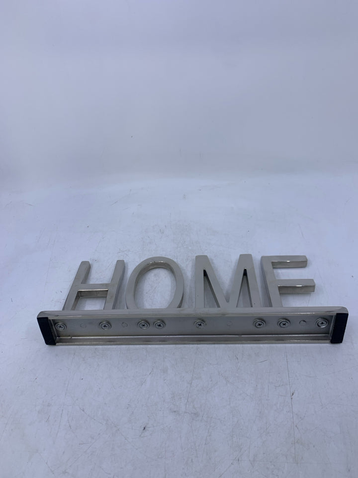 SILVER METAL HOME STANDING SIGN.