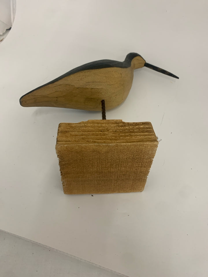 WOOD SAND PIPER ON WOOD STAND.
