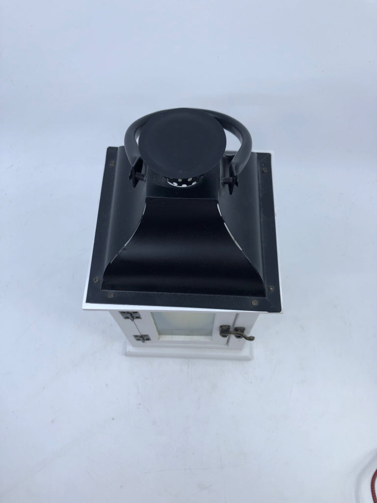 WHITE/BLACK LANTERN WITH LED FLICKERING CANDLE.