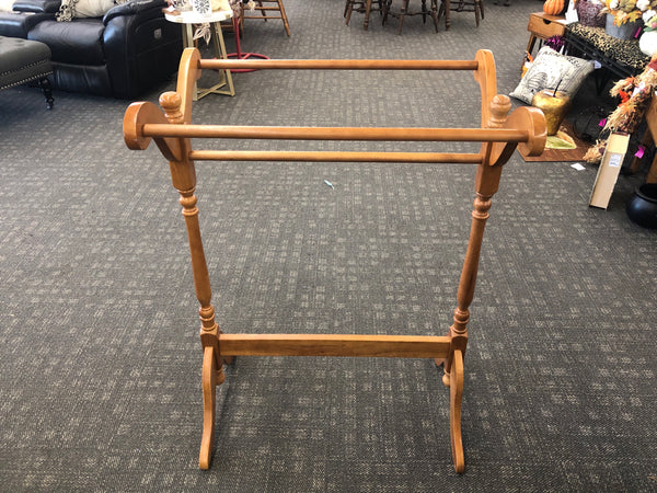 BLONDE WOOD BLANKET RACK.