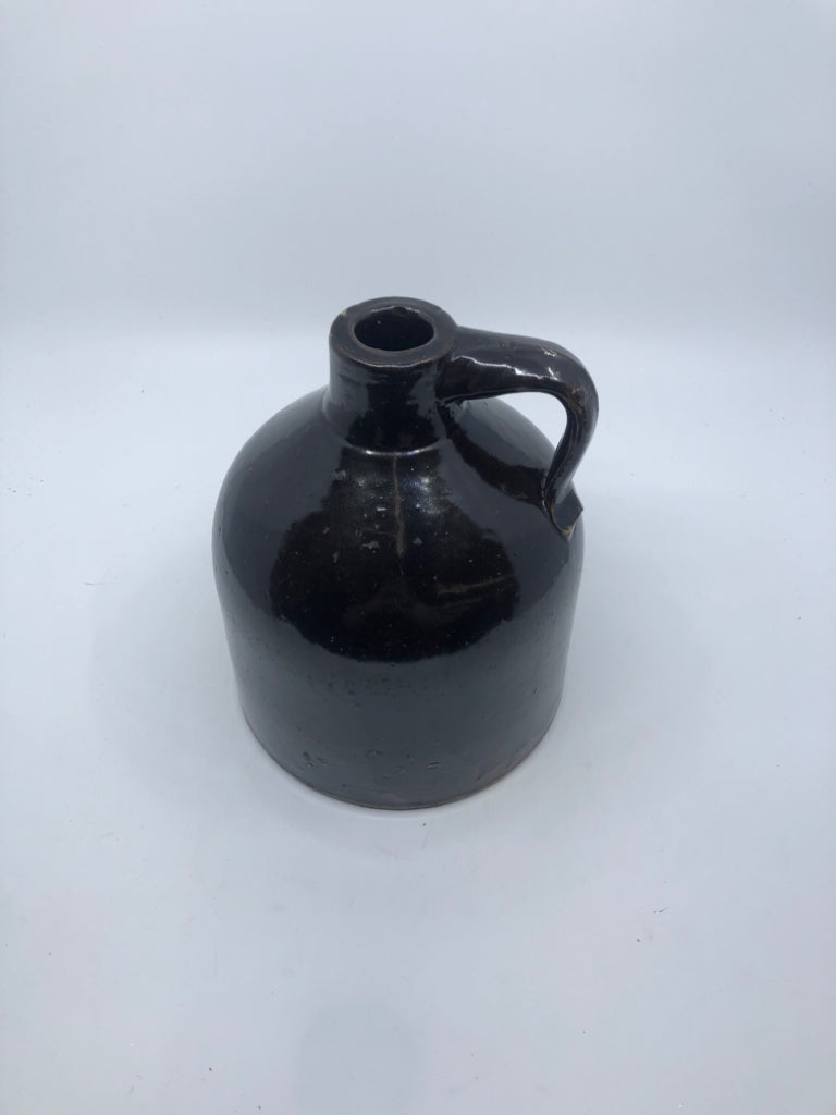 DARK BROWN POTTERY JUG.