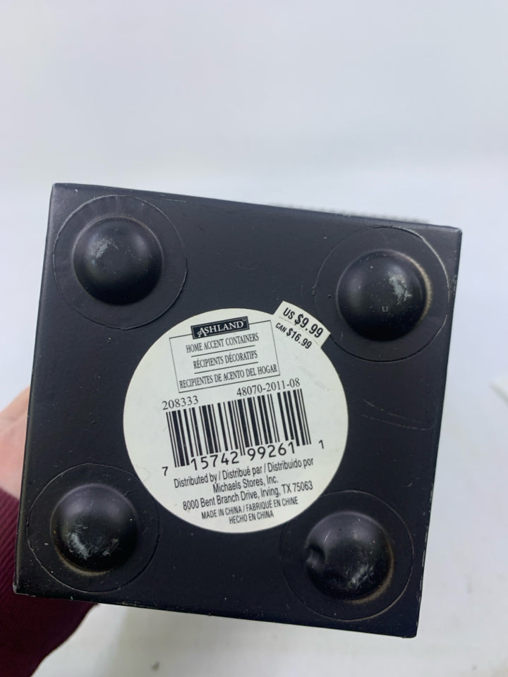 BROWN METAL PLANTER W/ EMBOSSED SCROLL.