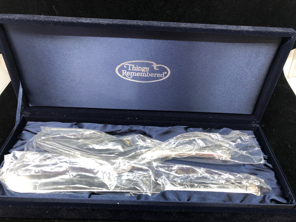 2PC SILVER CAKE SERVING SET.