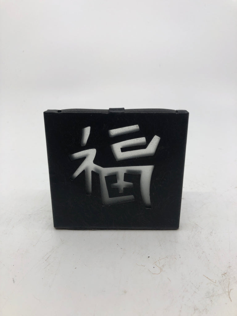 CHINESE SYMBOL TEA LIGHT HOLDER.