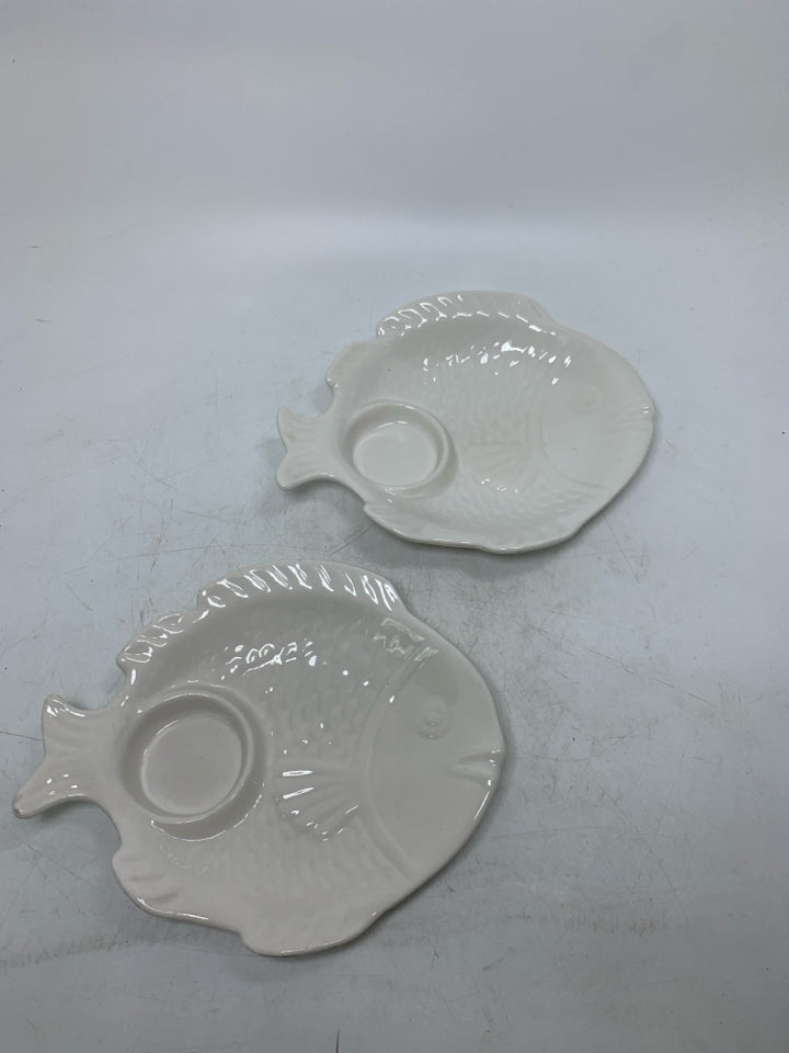 2 POTTERY FISH SHAPED TEXTURED TEA LIGHT HOLDERS.