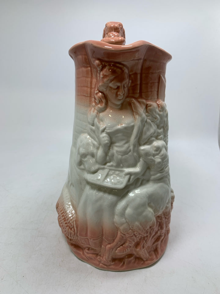 VTG MAIDEN READING W/ DOGS OMBRE PEACH COLOR DOG SHAPED HANDLE.