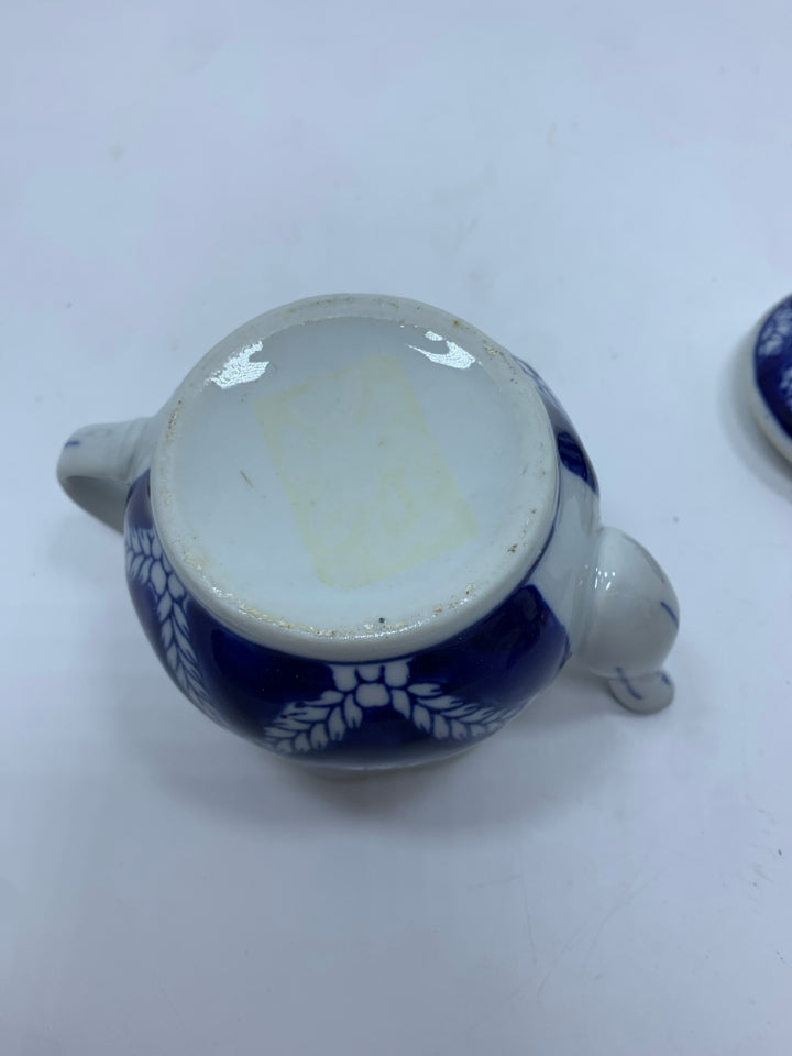 COBALT BLUE TEAPOT W/LEAF PATTERN.