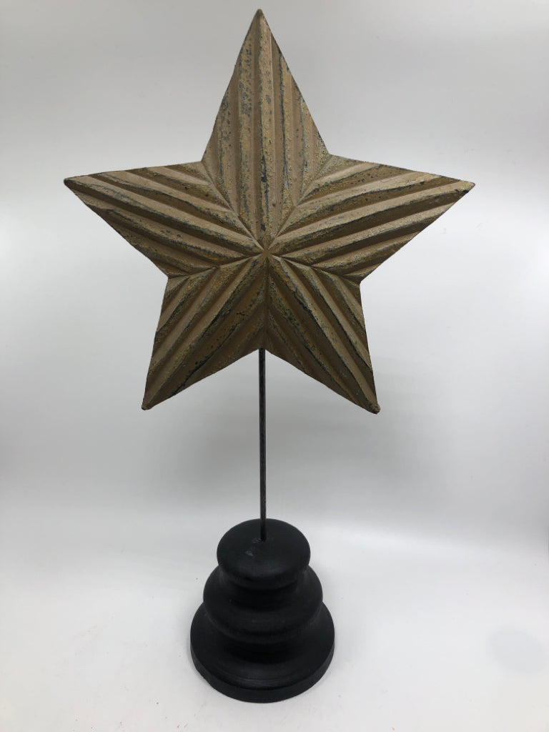 PRIMITIVE CARVED STAR DECOR.