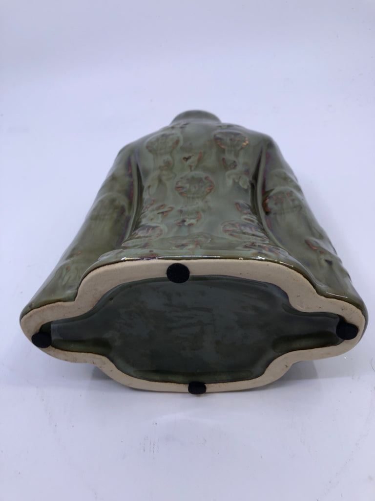 OLIVE GREEN JACKET SHAPED VASE.