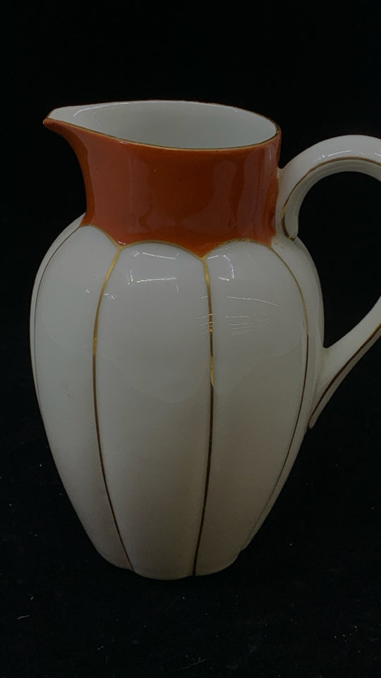 VTG GOLD RIBBED ORANGE SPOUT PORCELAIN PITCHER.
