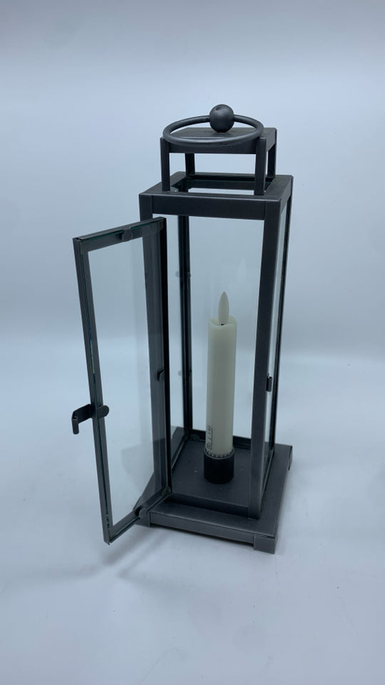 GREY METAL LAMP W/FAUX CANDLE.
