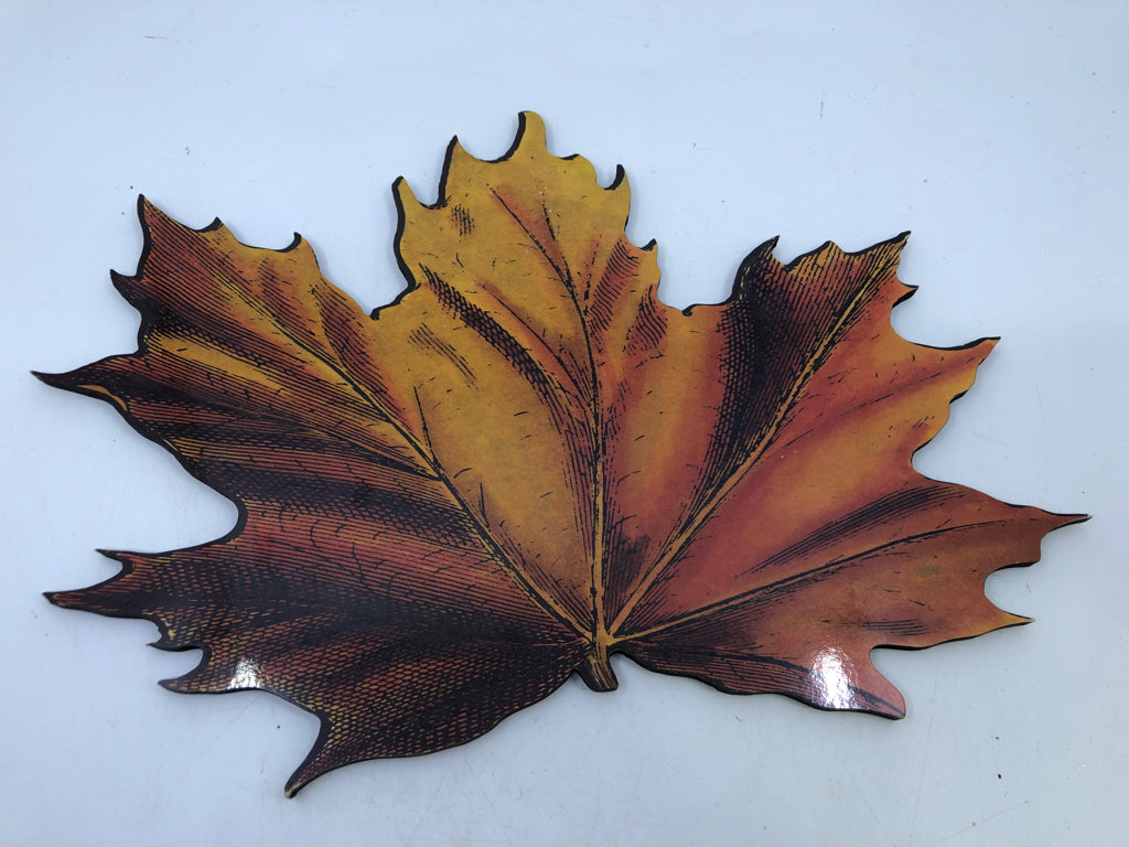 ORANGE MAPLE LEAF TRIVET.