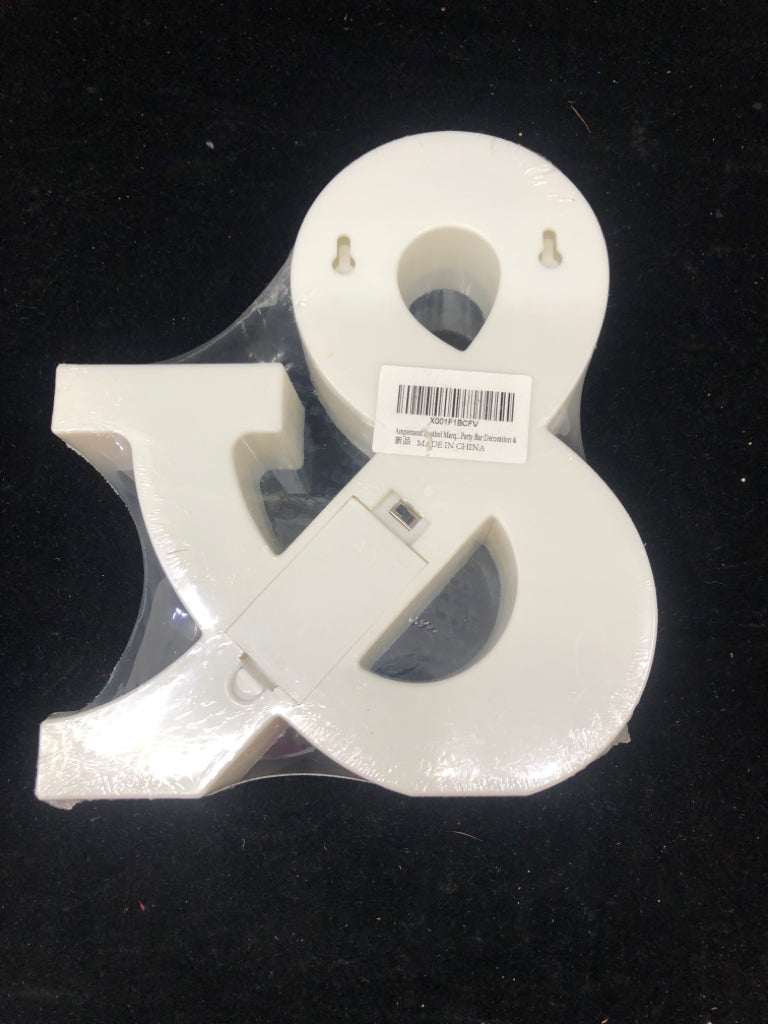 NIP LIGHT UP "&" WHITE SIGN.