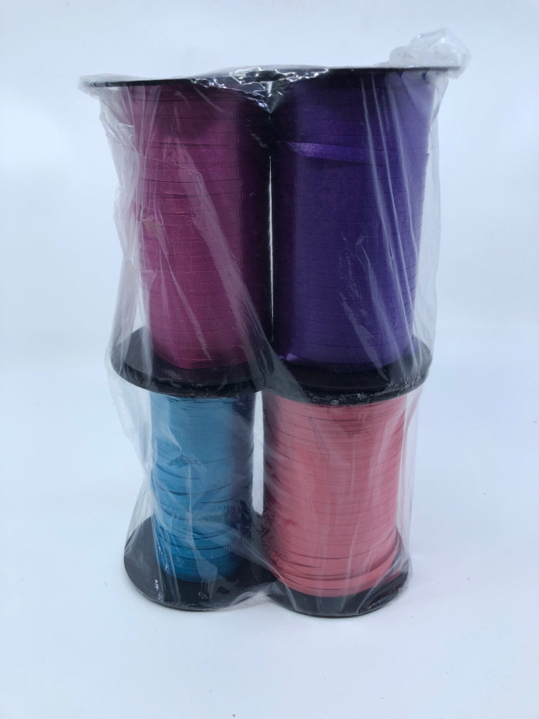 4 SPOOLS OF RIBBON PURPLE,PINK,BLUE,RED IN BAG.