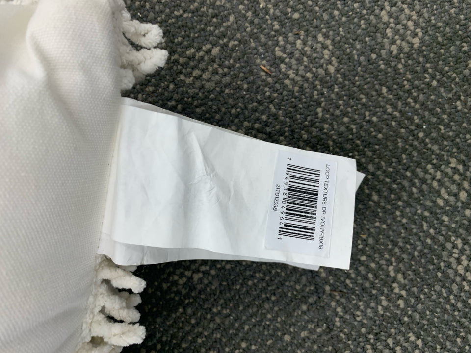 WHITE TEXTURED LOOP PILLOW.