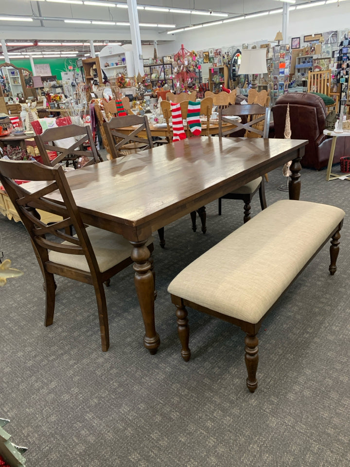 DARK WOOD TABLE W 4 CREAM CUSHIONED CHAIRS AND BENCH.