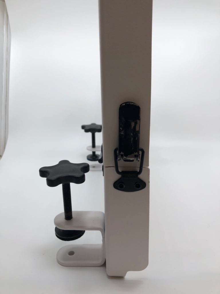 WHITE METAL BEDSIDE ATTACHABLE FOLDING SHELF.