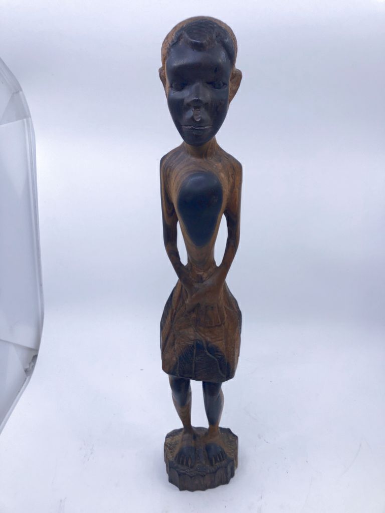 WOOD CARVED CHILD STANDING.