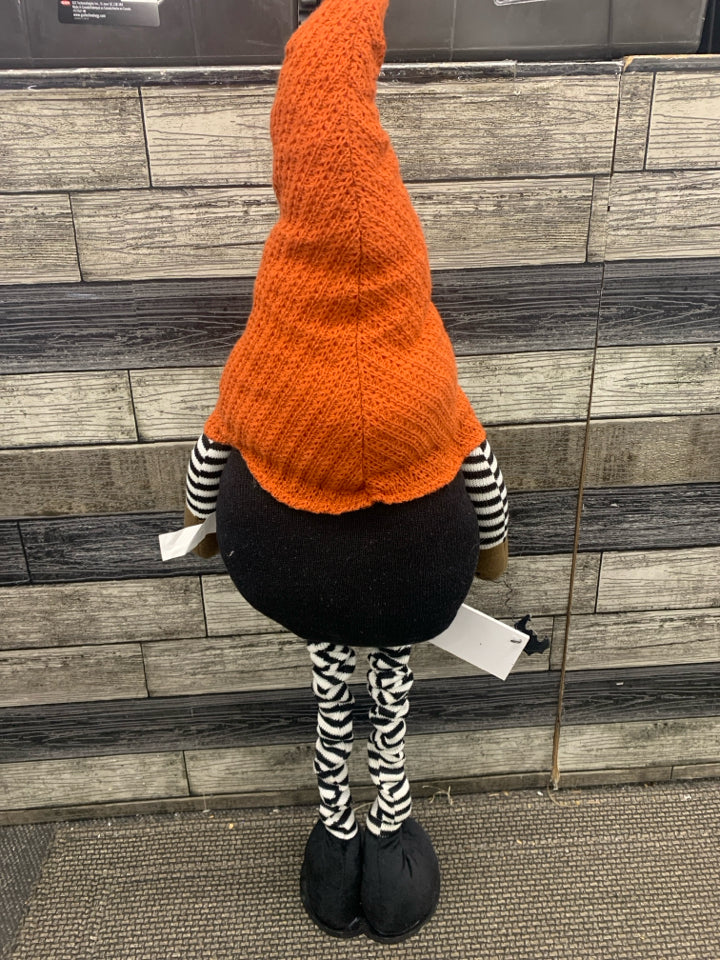 TALL GNOME W ORANGE HAT.
