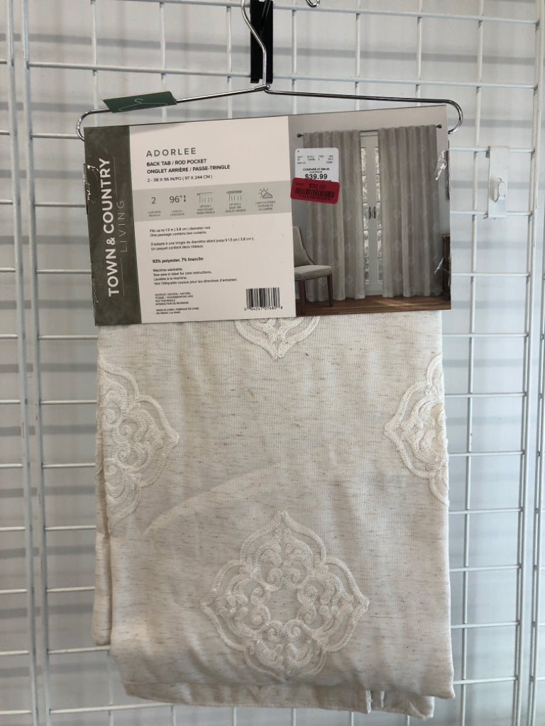 NIP 2PK CREAM BACK TAB CURTAINS.