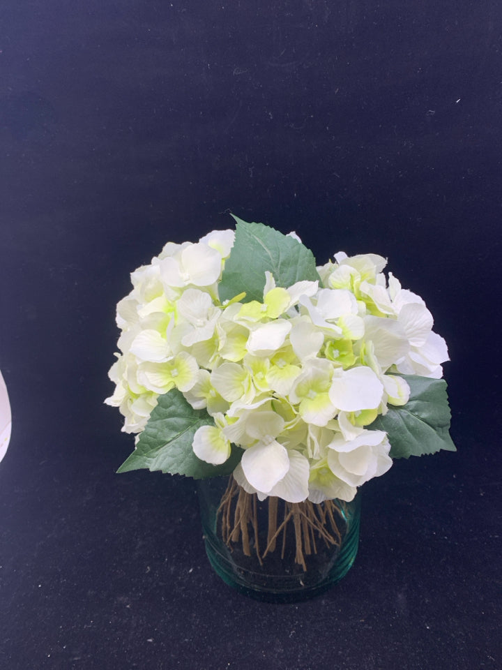 CYLINDER GLASS VASE W/WHITE FLOWERS.