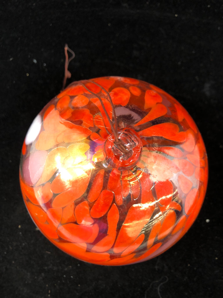 BLOWN GLASS ORANGE FLORAL DESIGN BALL.