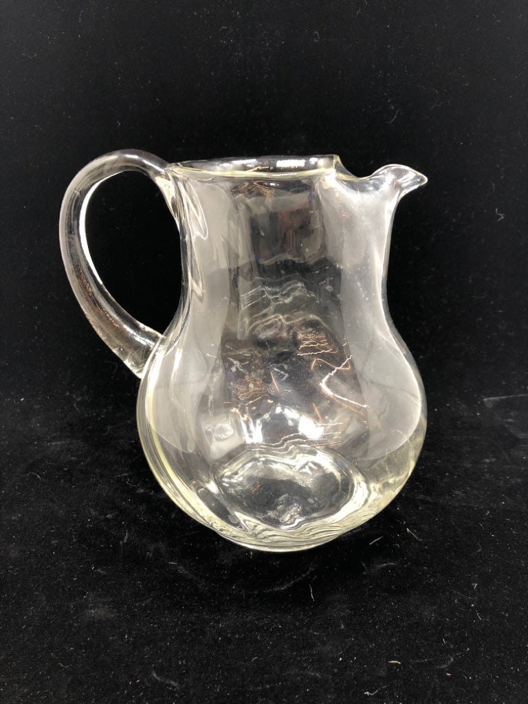 CLEAR SWIRL GLASS WITH ICE LIP.