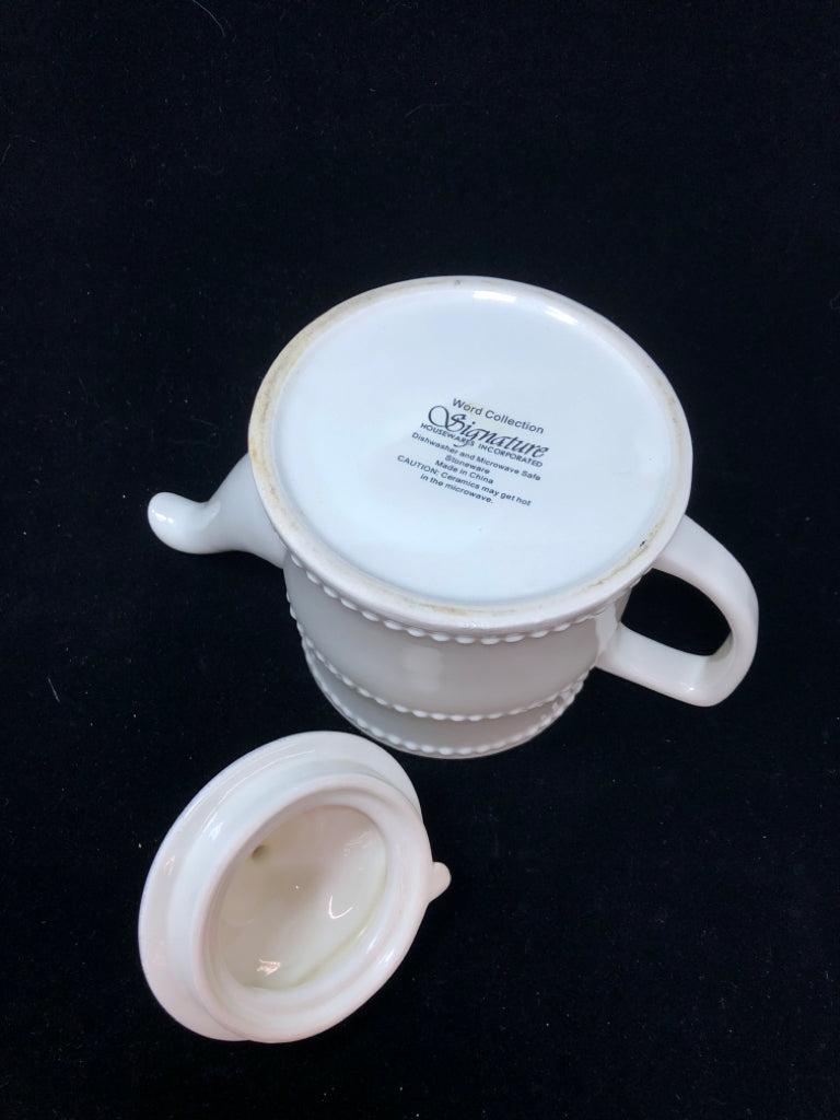 TEAPOT W/RED DETAILS.