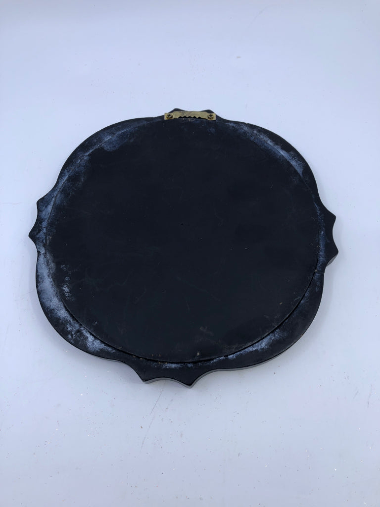 SMALL BLACK MIRROR.