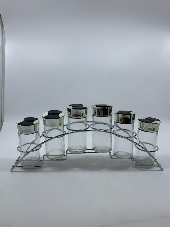 6GLASS SPICE JARS IN METAL STAND.